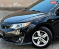 Черный Тойота Камри, объемом двигателя 2.5 л и пробегом 206 тыс. км за 10999 $, фото 1 на Automoto.ua