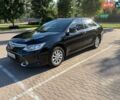 Черный Тойота Камри, объемом двигателя 2.49 л и пробегом 183 тыс. км за 15900 $, фото 1 на Automoto.ua
