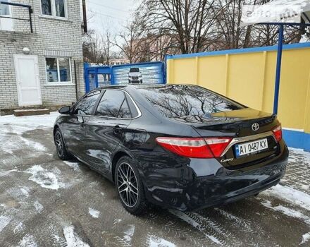 Черный Тойота Камри, объемом двигателя 2.5 л и пробегом 119 тыс. км за 13500 $, фото 21 на Automoto.ua