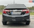 Черный Тойота Камри, объемом двигателя 2.49 л и пробегом 220 тыс. км за 12800 $, фото 5 на Automoto.ua