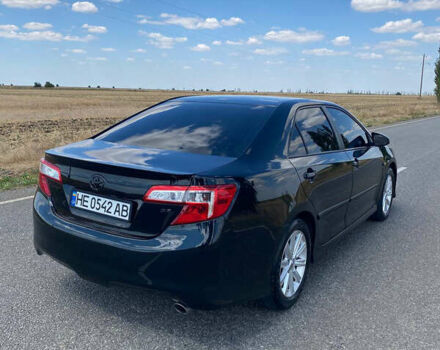 Чорний Тойота Камрі, об'ємом двигуна 2.49 л та пробігом 190 тис. км за 12250 $, фото 4 на Automoto.ua