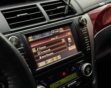 Черный Тойота Камри, объемом двигателя 2.5 л и пробегом 257 тыс. км за 13990 $, фото 21 на Automoto.ua