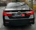 Черный Тойота Камри, объемом двигателя 2.5 л и пробегом 257 тыс. км за 13990 $, фото 9 на Automoto.ua