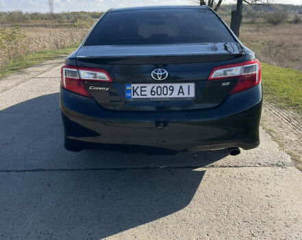 Черный Тойота Камри, объемом двигателя 2.49 л и пробегом 237 тыс. км за 12300 $, фото 6 на Automoto.ua