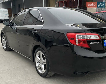 Чорний Тойота Камрі, об'ємом двигуна 2.49 л та пробігом 149 тис. км за 13400 $, фото 2 на Automoto.ua