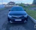 Чорний Тойота Камрі, об'ємом двигуна 2.49 л та пробігом 224 тис. км за 13900 $, фото 1 на Automoto.ua