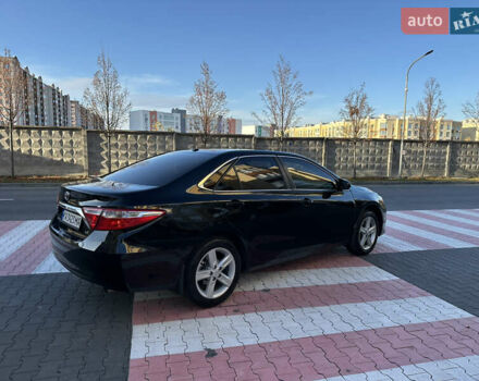 Черный Тойота Камри, объемом двигателя 2.49 л и пробегом 97 тыс. км за 12800 $, фото 7 на Automoto.ua