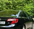 Черный Тойота Камри, объемом двигателя 2.5 л и пробегом 180 тыс. км за 12400 $, фото 1 на Automoto.ua