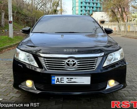 Черный Тойота Камри, объемом двигателя 2.5 л и пробегом 208 тыс. км за 9500 $, фото 1 на Automoto.ua