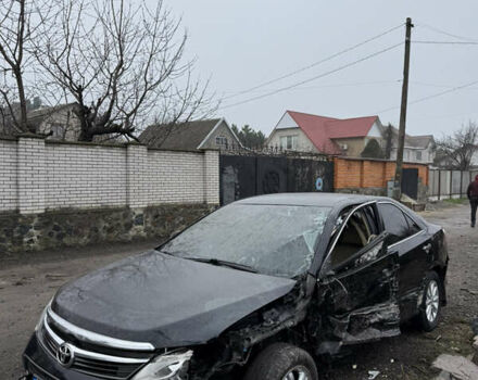 Черный Тойота Камри, объемом двигателя 2.49 л и пробегом 190 тыс. км за 7000 $, фото 1 на Automoto.ua