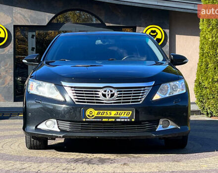 Черный Тойота Камри, объемом двигателя 2.49 л и пробегом 260 тыс. км за 13750 $, фото 1 на Automoto.ua