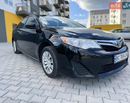 Черный Тойота Камри, объемом двигателя 2.49 л и пробегом 195 тыс. км за 11250 $, фото 3 на Automoto.ua