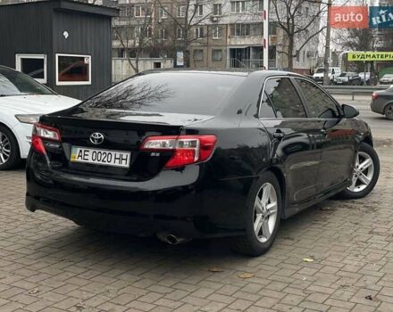 Черный Тойота Камри, объемом двигателя 2.49 л и пробегом 210 тыс. км за 12300 $, фото 3 на Automoto.ua