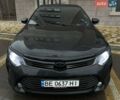 Черный Тойота Камри, объемом двигателя 2.49 л и пробегом 244 тыс. км за 15500 $, фото 1 на Automoto.ua