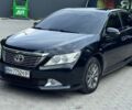 Черный Тойота Камри, объемом двигателя 2.49 л и пробегом 230 тыс. км за 14000 $, фото 1 на Automoto.ua