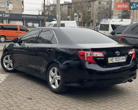 Черный Тойота Камри, объемом двигателя 2.49 л и пробегом 210 тыс. км за 12300 $, фото 5 на Automoto.ua