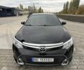 Черный Тойота Камри, объемом двигателя 2.5 л и пробегом 196 тыс. км за 17450 $, фото 1 на Automoto.ua