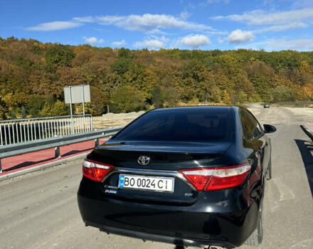 Чорний Тойота Камрі, об'ємом двигуна 2.49 л та пробігом 250 тис. км за 14500 $, фото 1 на Automoto.ua