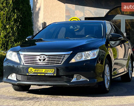 Черный Тойота Камри, объемом двигателя 2.49 л и пробегом 260 тыс. км за 13750 $, фото 2 на Automoto.ua