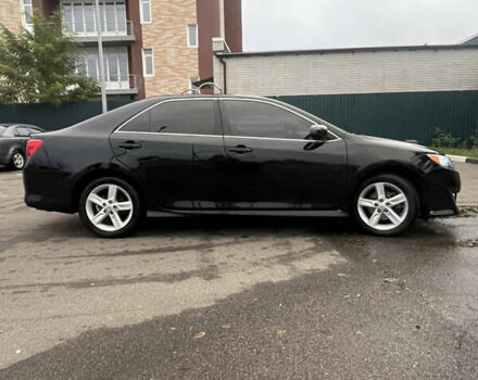 Черный Тойота Камри, объемом двигателя 2.5 л и пробегом 240 тыс. км за 14000 $, фото 7 на Automoto.ua