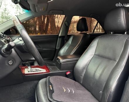 Черный Тойота Камри, объемом двигателя 2.5 л и пробегом 257 тыс. км за 13990 $, фото 23 на Automoto.ua