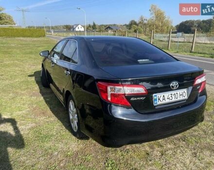 Черный Тойота Камри, объемом двигателя 2.5 л и пробегом 130 тыс. км за 11500 $, фото 2 на Automoto.ua