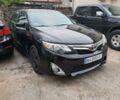 Черный Тойота Камри, объемом двигателя 2.5 л и пробегом 220 тыс. км за 11800 $, фото 1 на Automoto.ua