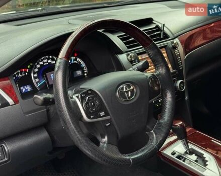 Черный Тойота Камри, объемом двигателя 2.5 л и пробегом 257 тыс. км за 13990 $, фото 18 на Automoto.ua