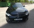 Черный Тойота Камри, объемом двигателя 2.5 л и пробегом 203 тыс. км за 15300 $, фото 1 на Automoto.ua