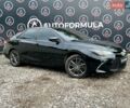 Чорний Тойота Камрі, об'ємом двигуна 2.49 л та пробігом 225 тис. км за 12790 $, фото 1 на Automoto.ua