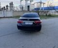 Черный Тойота Камри, объемом двигателя 2.5 л и пробегом 128 тыс. км за 13500 $, фото 1 на Automoto.ua