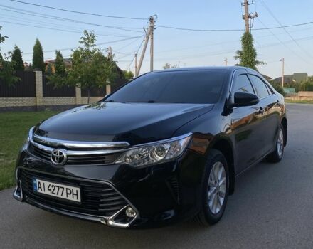 Черный Тойота Камри, объемом двигателя 2.5 л и пробегом 190 тыс. км за 329 $, фото 1 на Automoto.ua