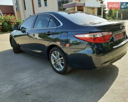 Черный Тойота Камри, объемом двигателя 2.49 л и пробегом 231 тыс. км за 12200 $, фото 2 на Automoto.ua