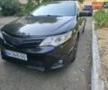 Чорний Тойота Камрі, об'ємом двигуна 2.49 л та пробігом 180 тис. км за 11000 $, фото 1 на Automoto.ua