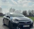 Чорний Тойота Камрі, об'ємом двигуна 2.5 л та пробігом 176 тис. км за 15300 $, фото 1 на Automoto.ua