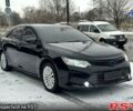 Черный Тойота Камри, объемом двигателя 2.4 л и пробегом 180 тыс. км за 13700 $, фото 1 на Automoto.ua