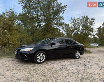 Черный Тойота Камри, объемом двигателя 2.49 л и пробегом 171 тыс. км за 14500 $, фото 1 на Automoto.ua