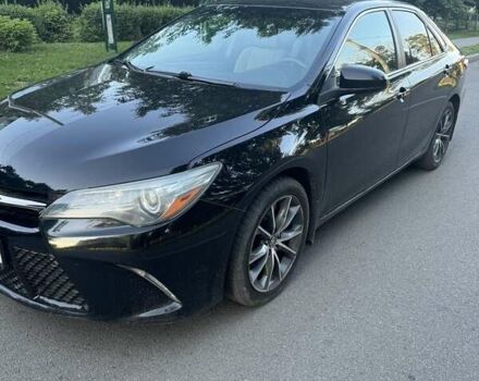 Чорний Тойота Камрі, об'ємом двигуна 2.5 л та пробігом 186 тис. км за 14700 $, фото 1 на Automoto.ua