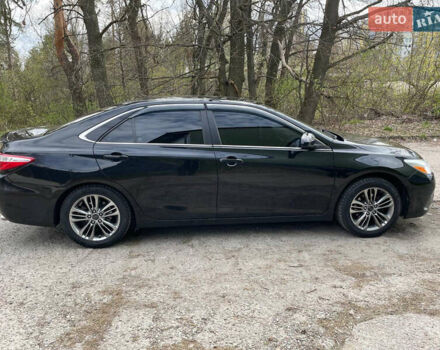 Чорний Тойота Камрі, об'ємом двигуна 2.49 л та пробігом 262 тис. км за 13800 $, фото 11 на Automoto.ua