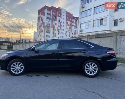 Чорний Тойота Камрі, об'ємом двигуна 2.49 л та пробігом 223 тис. км за 12700 $, фото 1 на Automoto.ua