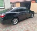 Чорний Тойота Камрі, об'ємом двигуна 2.49 л та пробігом 133 тис. км за 15500 $, фото 1 на Automoto.ua