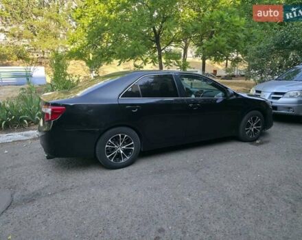 Чорний Тойота Камрі, об'ємом двигуна 2.49 л та пробігом 180 тис. км за 11000 $, фото 1 на Automoto.ua