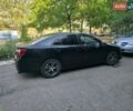 Чорний Тойота Камрі, об'ємом двигуна 2.49 л та пробігом 180 тис. км за 11000 $, фото 1 на Automoto.ua