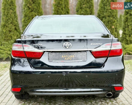 Чорний Тойота Камрі, об'ємом двигуна 2.49 л та пробігом 135 тис. км за 19999 $, фото 4 на Automoto.ua