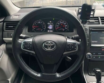 Черный Тойота Камри, объемом двигателя 2.5 л и пробегом 167 тыс. км за 13500 $, фото 19 на Automoto.ua