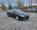 Черный Тойота Камри, объемом двигателя 2.5 л и пробегом 183 тыс. км за 14900 $, фото 1 на Automoto.ua