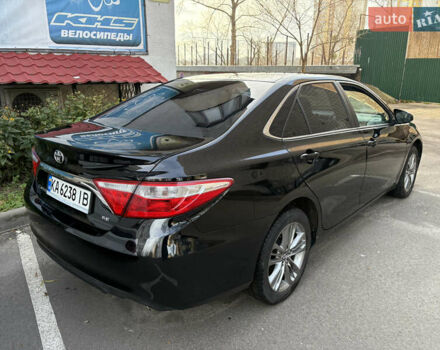 Черный Тойота Камри, объемом двигателя 2.49 л и пробегом 216 тыс. км за 13300 $, фото 1 на Automoto.ua