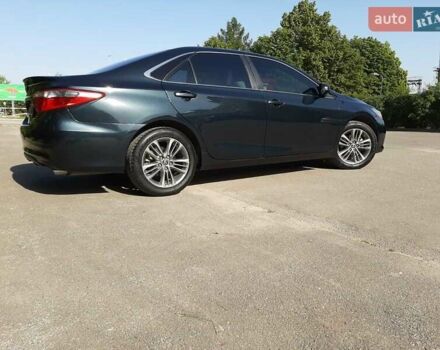 Черный Тойота Камри, объемом двигателя 2.49 л и пробегом 231 тыс. км за 12200 $, фото 1 на Automoto.ua