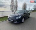 Черный Тойота Камри, объемом двигателя 2.49 л и пробегом 121 тыс. км за 16000 $, фото 1 на Automoto.ua