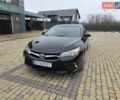 Чорний Тойота Камрі, об'ємом двигуна 2.49 л та пробігом 183 тис. км за 13900 $, фото 1 на Automoto.ua